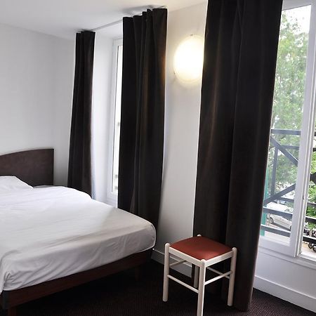 Hotel De La Tour Párizs Szoba fotó